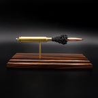 Front view of a .300 Weatherby Magnum Hornady Precision Hunter 200gr ELD-X cartridge anatomy display showing the primer cup, anvil, cartridge case, simulated powder, and projectile on a Bolivian rosewood base.