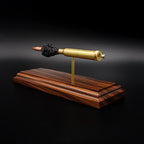 Angled rear view of a .300 Weatherby Magnum Hornady Precision Hunter 200gr ELD-X cartridge anatomy display featuring the primer cup, anvil, cartridge case, simulated powder, and projectile on a Bolivian rosewood base.