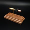 30 Carbine FMJ exploded cartridge anatomy model on walnut base