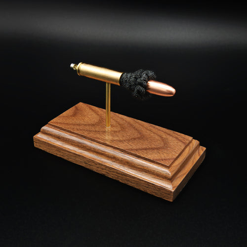 30 Carbine FMJ exploded cartridge anatomy model on walnut base