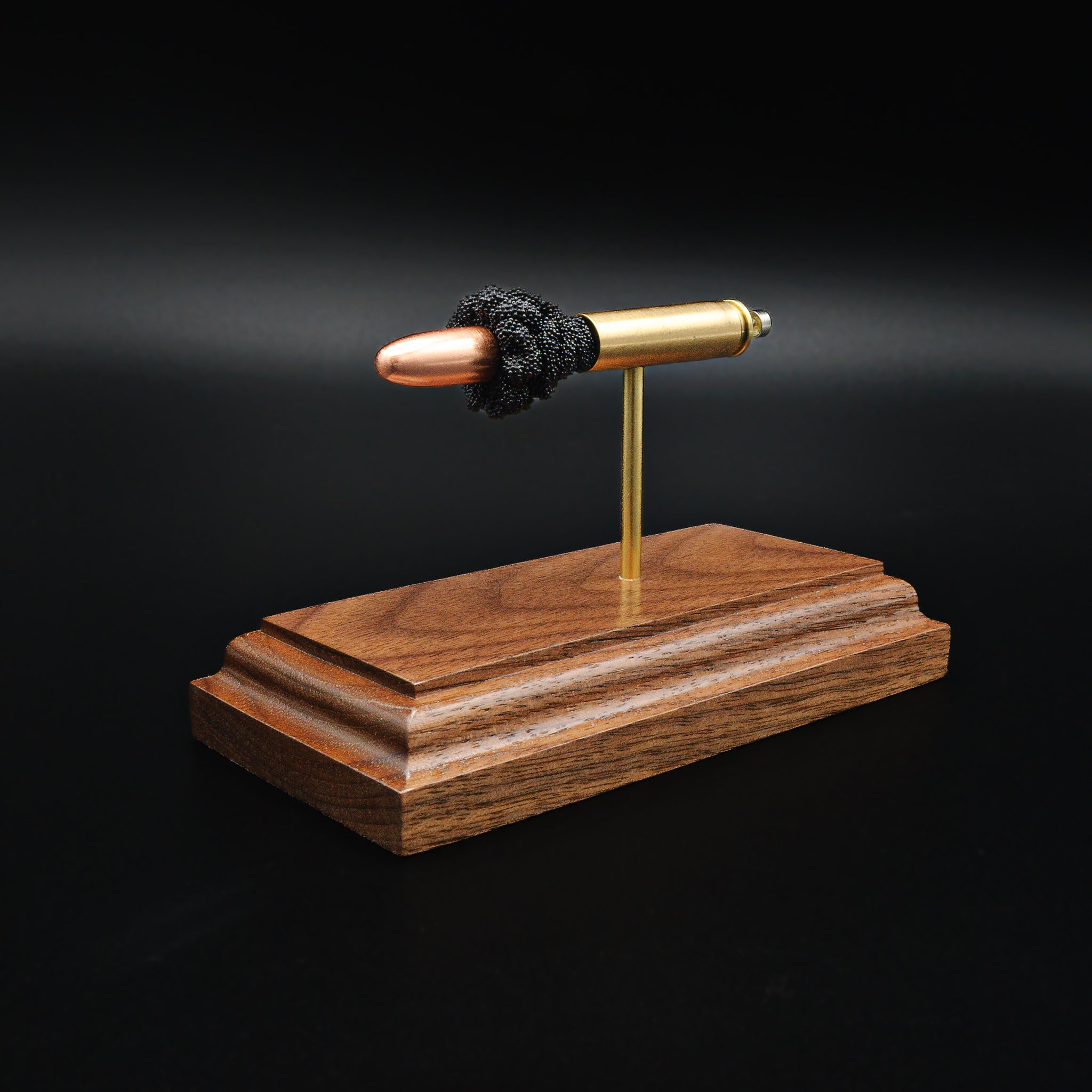 Front angled view of 30 Carbine full metal jacket bullet in exploded display