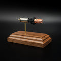 40 S&W G2 Research RIP exploded cartridge anatomy display on walnut wood base