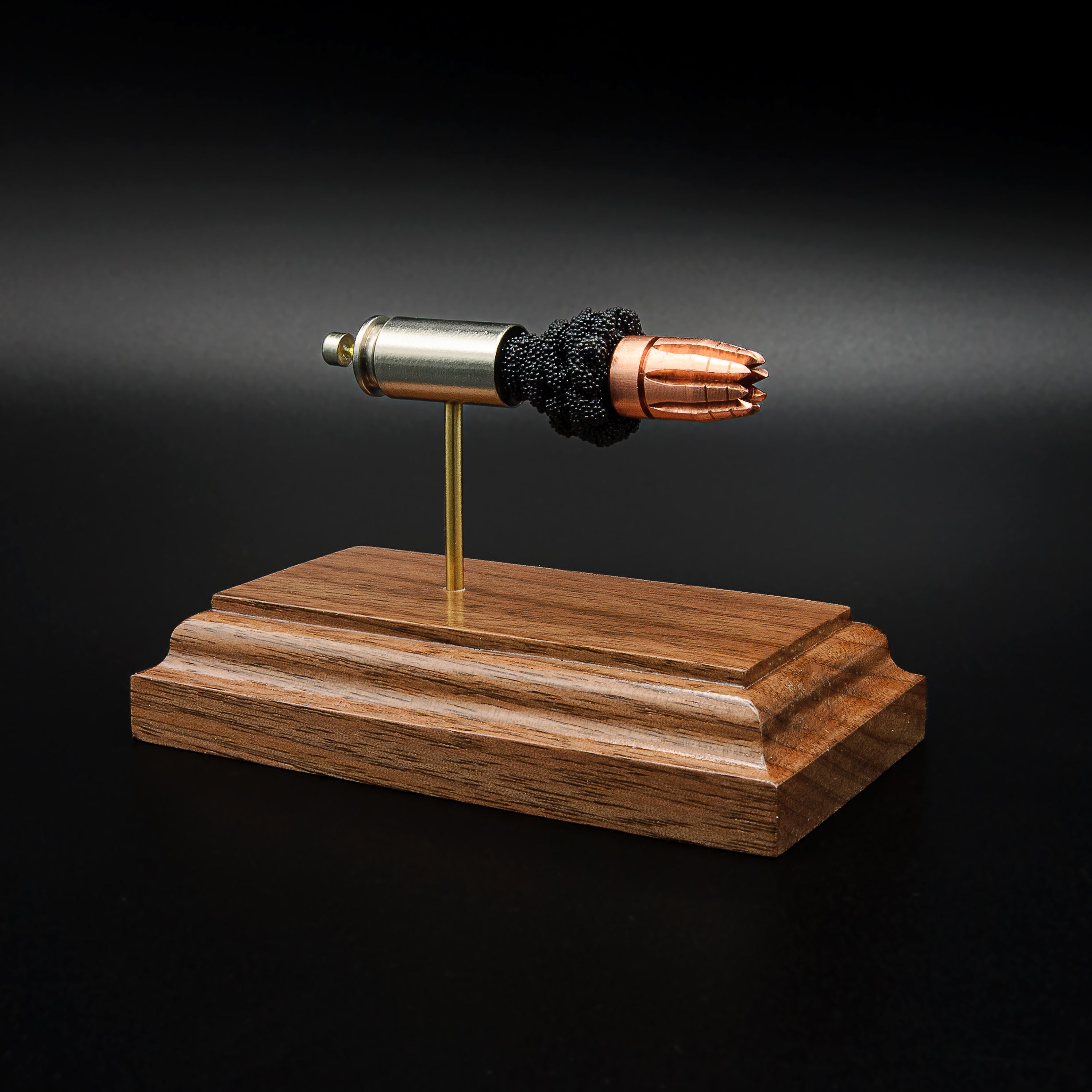 40 S&W G2 Research RIP exploded cartridge anatomy display on walnut wood base