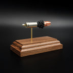 40 S&W G2 Research RIP bullet anatomy model showing case, powder, and projectile on walnut base