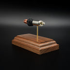 Detailed 40 S&W G2 Research RIP exploded ammunition model mounted on solid walnut base