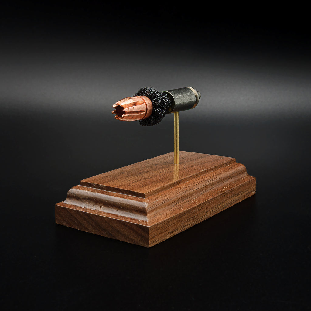 Premium walnut display featuring an exploded 40 S&W G2 Research RIP cartridge model