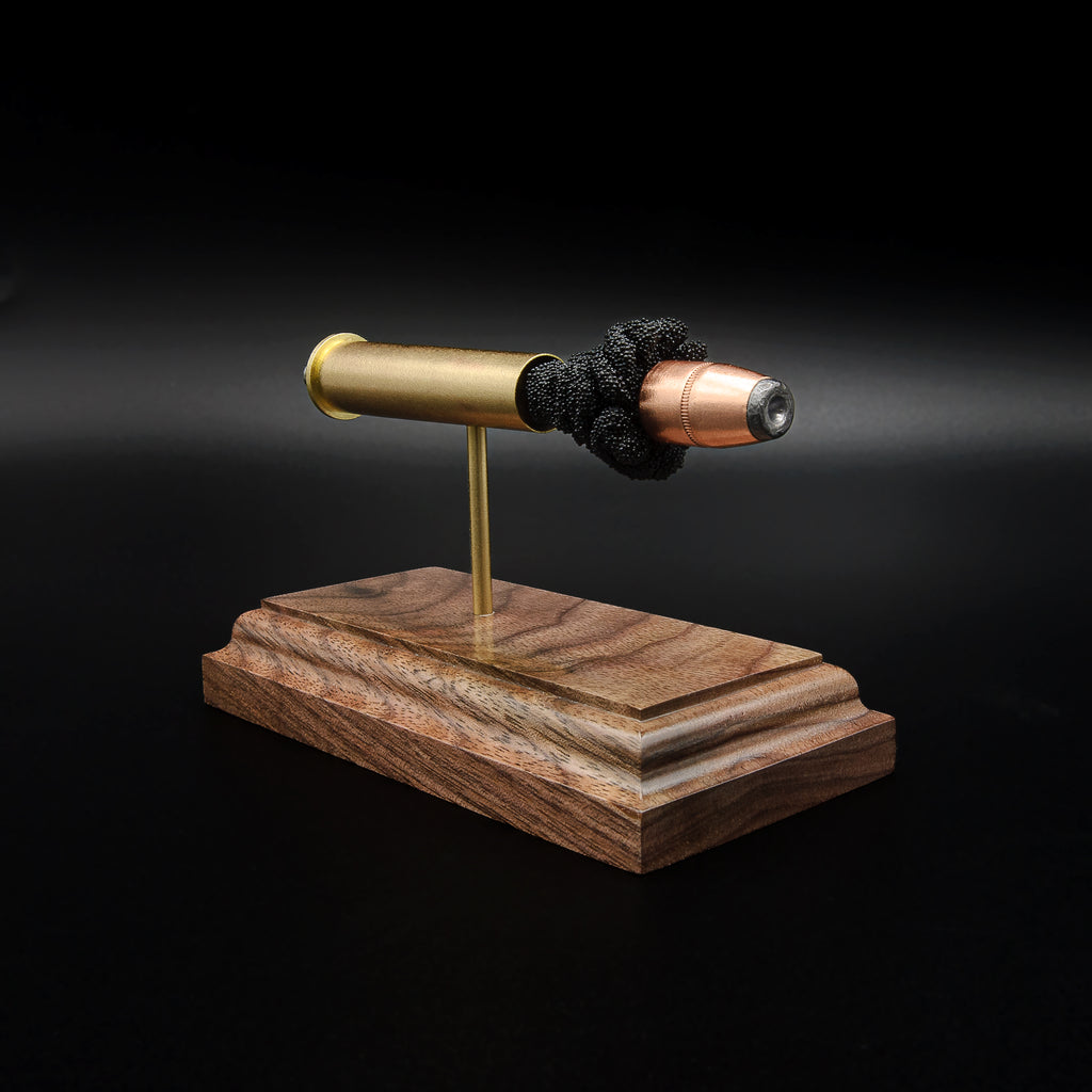 Right-front angle of an inert .45-70 Government exploded ammunition display showing the Hornady 300gr InterLock HP projectile and exposed simulated powder.