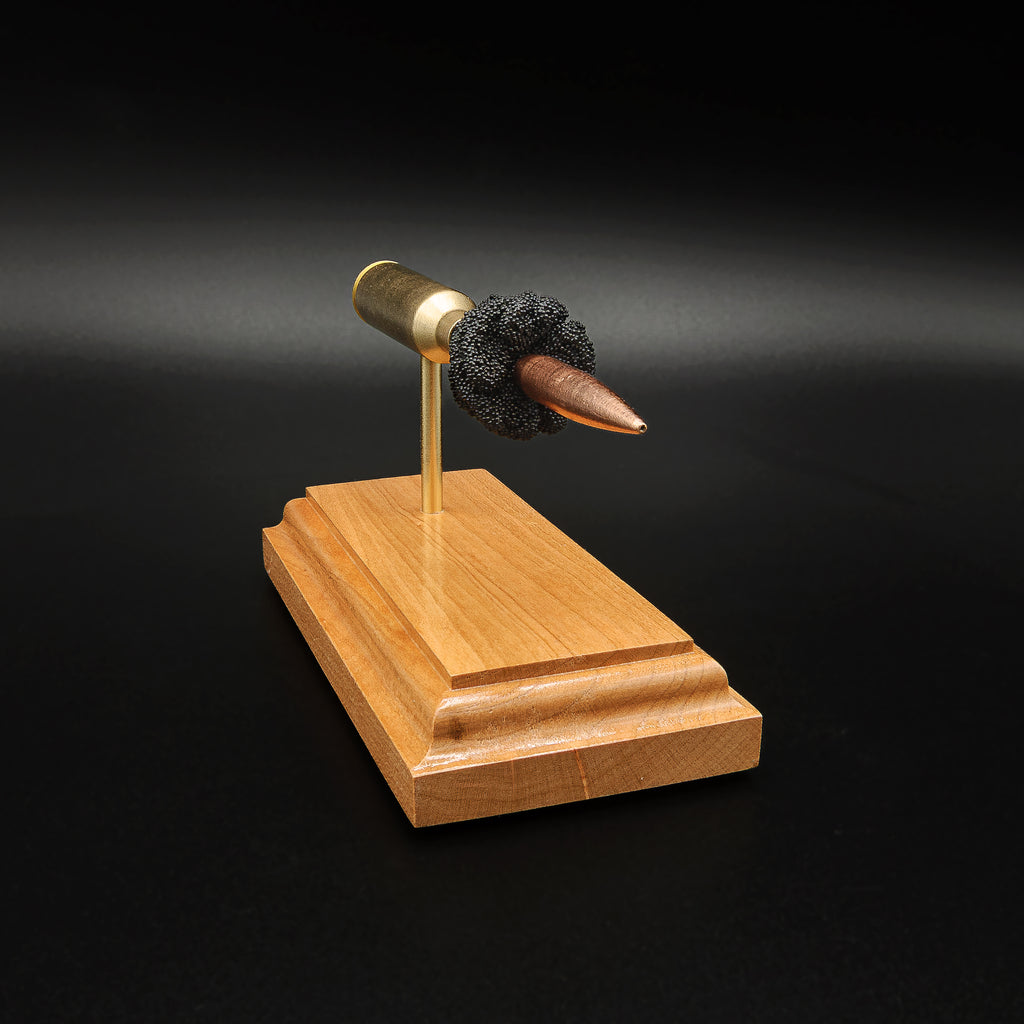 Angled view of the expanded 6.5 PRC display highlighting the Berger 153.5gr Long Range Hybrid Target projectile, Lapua cartridge case, simulated powder, primer cup, and anvil.
