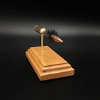 Angled view of the expanded 6.5 PRC display highlighting the Berger 153.5gr Long Range Hybrid Target projectile, Lapua cartridge case, simulated powder, primer cup, and anvil.