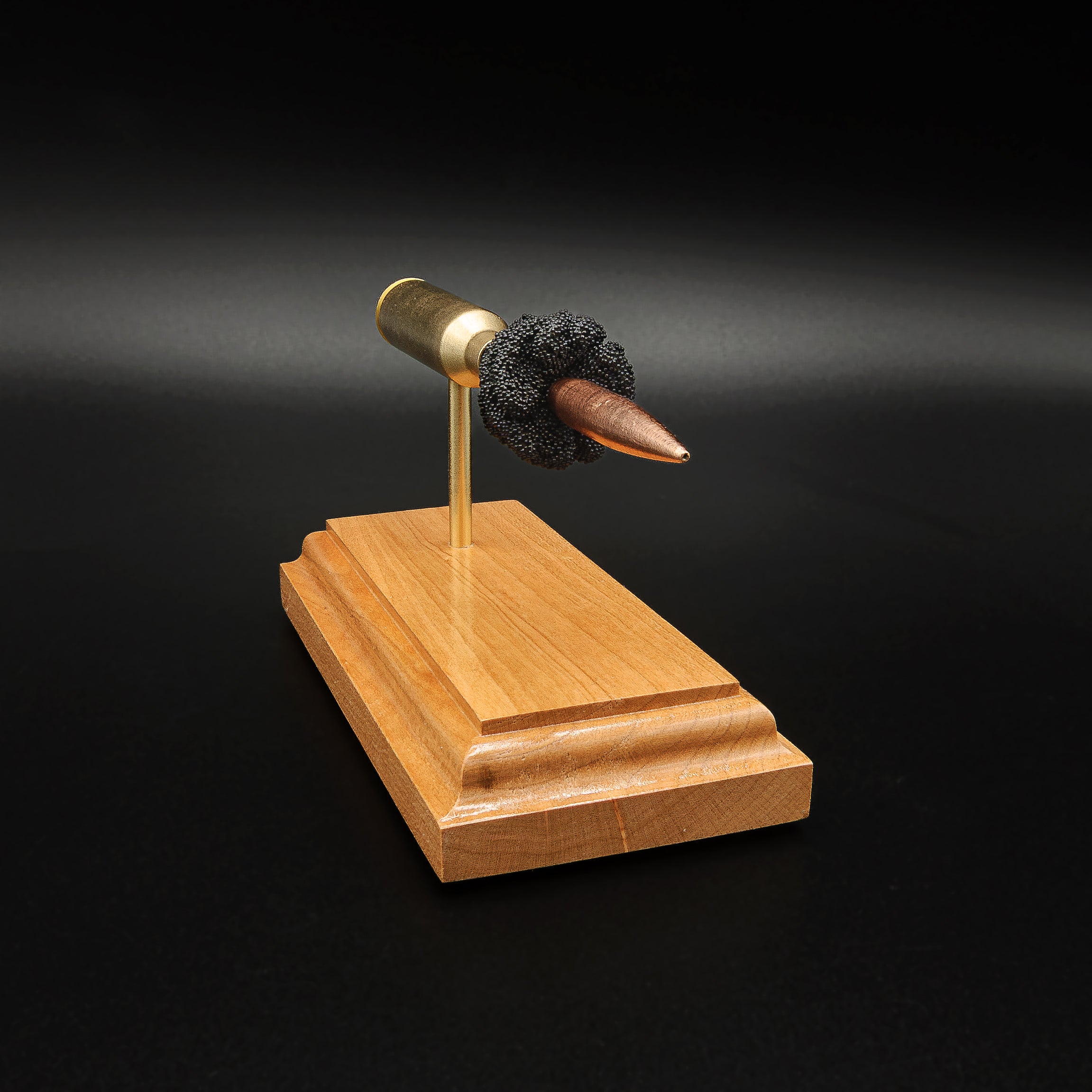 Angled view of the expanded 6.5 PRC display highlighting the Berger 153.5gr Long Range Hybrid Target projectile, Lapua cartridge case, simulated powder, primer cup, and anvil.