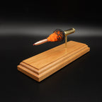 Detailed 6.5 Creedmoor FirePowder cartridge display with Hornady 143gr ELD-X projectile, Alpha Munitions brass, simulated orange and black powder, primer cup, and anvil.