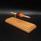 Three-quarter view of a 6.5 Creedmoor FirePowder anatomy model showing the Hornady 143gr ELD-X projectile, simulated powder effect, Alpha cartridge case, anvil, and primer cup on cherry.