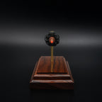 bullet end view of a 7.62x39 exploded cartridge model arranged in a straight line on a rosewood base