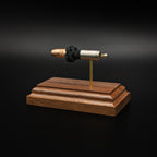 Rear-right perspective of a handcrafted 9mm Luger exploded cartridge display featuring the Federal 147gr HST hollow point projectile, nickel-plated case, exposed simulated powder, and walnut wood base.