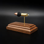 Handcrafted 9mm Luger Hornady Critical Defense 115gr FTX exploded cartridge display with exposed powder and bullet