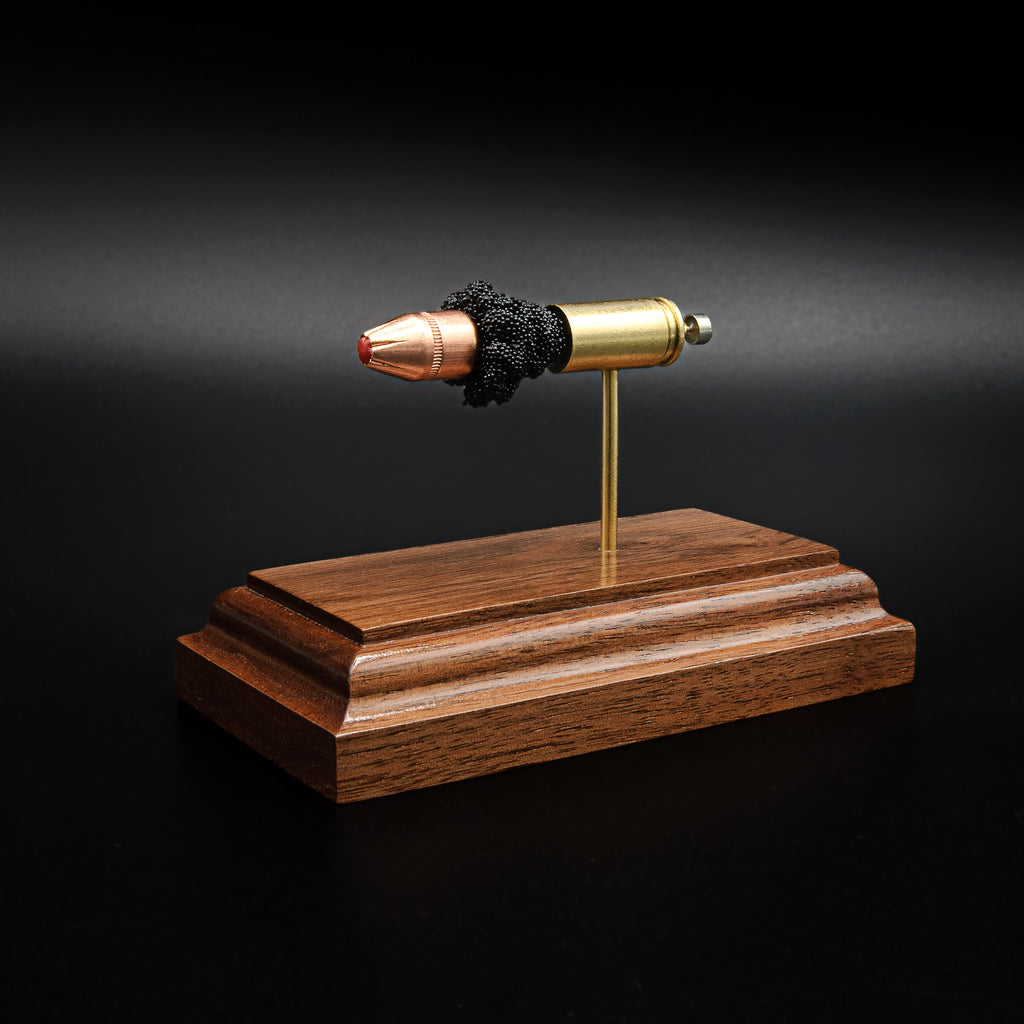 Detailed 9mm Luger Hornady Critical Defense FTX cartridge model featuring separated case, powder, and projectile