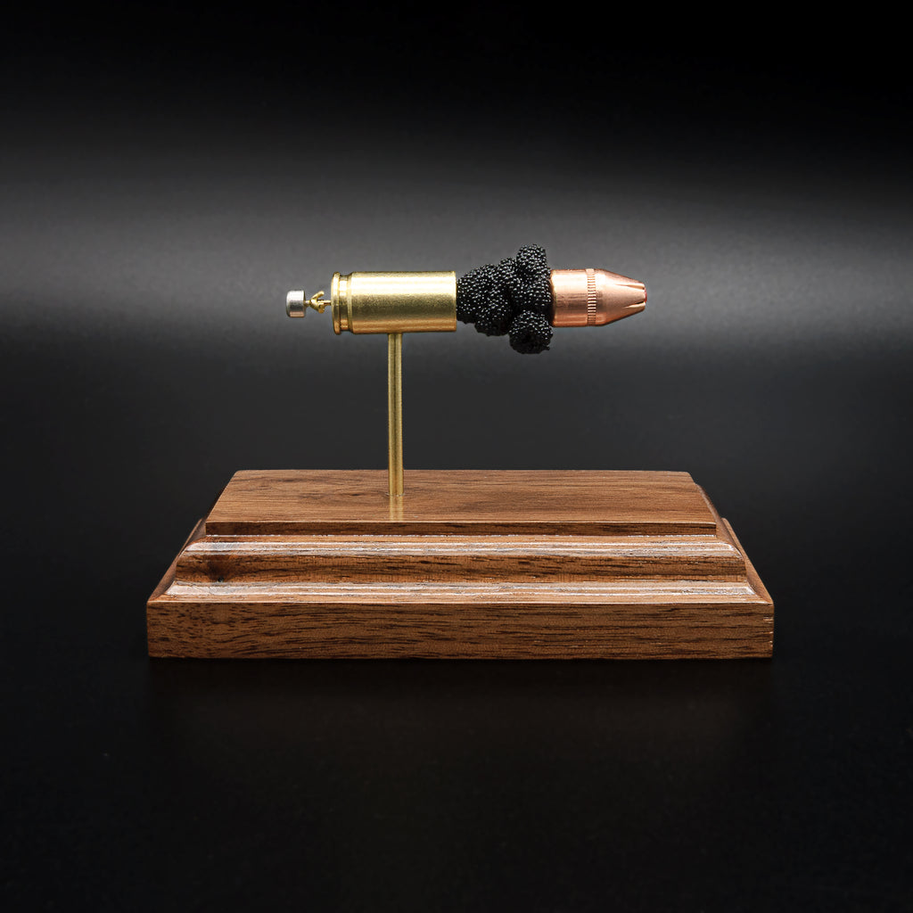 Educational 9mm Luger Hornady Critical Defense 115gr FTX cartridge anatomy display with realistic component layout