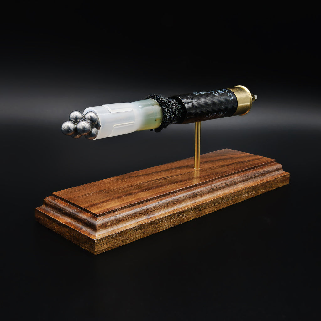 12ga Hornady Critical Defense buckshot model highlighting shot column, wad, and shell structure