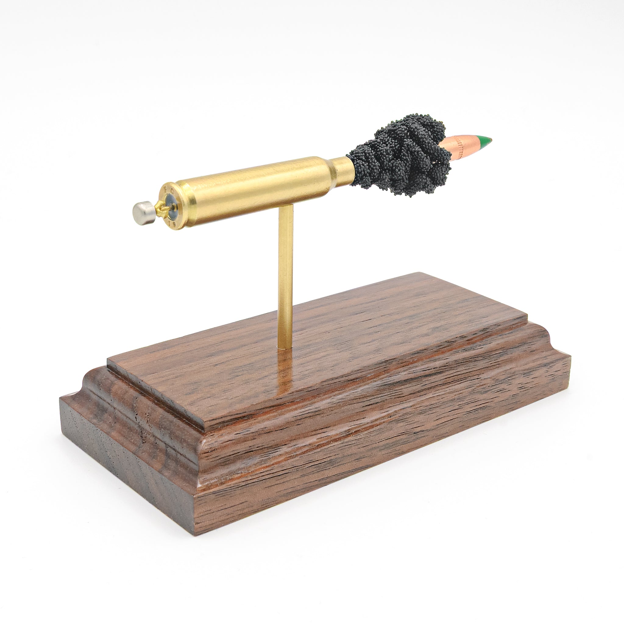 5.56x45mm M855 cutaway cartridge display mounted on solid hardwood base