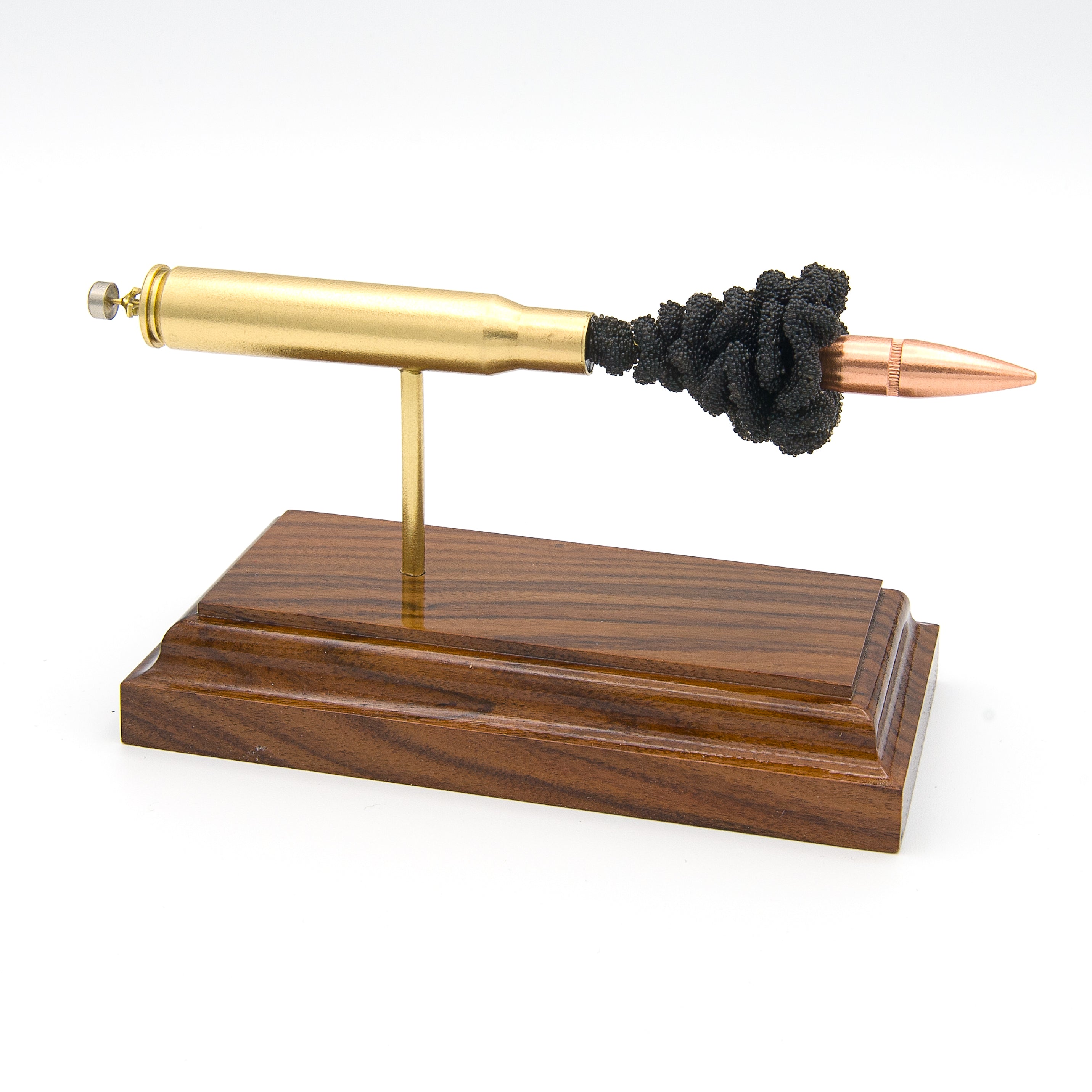 Expanded 30-06 Springfield cartridge display on hardwood base