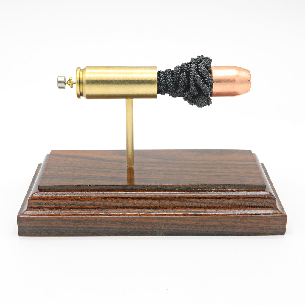 50 AE 300gr Hornady XTP expanded cartridge display model on cherry base