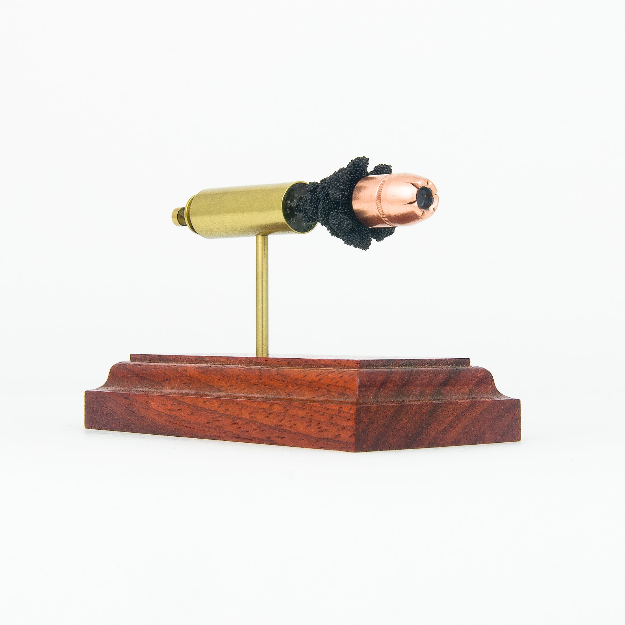 50 Beowulf cutaway cartridge display mounted on solid hardwood base