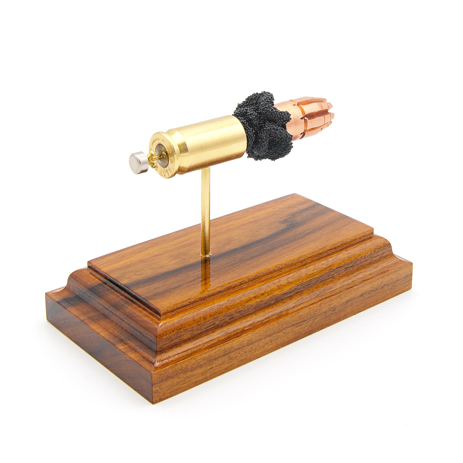 Exploded 45 ACP R.I.P. G2 round showing primer, case, powder, and projectile