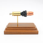 45 Auto R.I.P. G2 Research expanded cartridge anatomy display on hardwood base