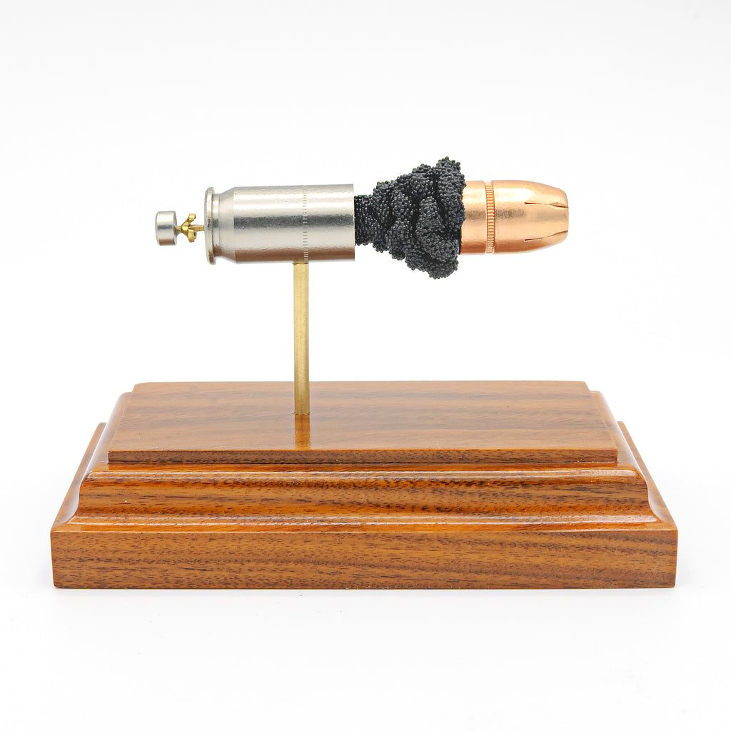 45 Auto +P Federal 230gr HST JHP expanded cartridge display model on hardwood base
