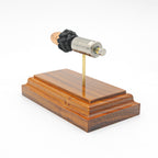 45 Auto +P HST cutaway cartridge display mounted on Bolivian Rosewood base