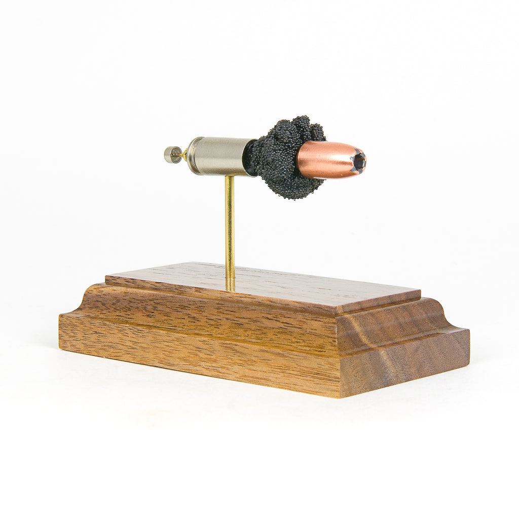 Handmade 9mm Speer Gold Dot cartridge display aligned on solid wood base