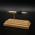 Expanded 300 Blackout Barnes Vor-TX cartridge display on hardwood base
