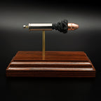 38 Special defensive hollow point cartridge display showing bullet, powder and primer components on rosewood base