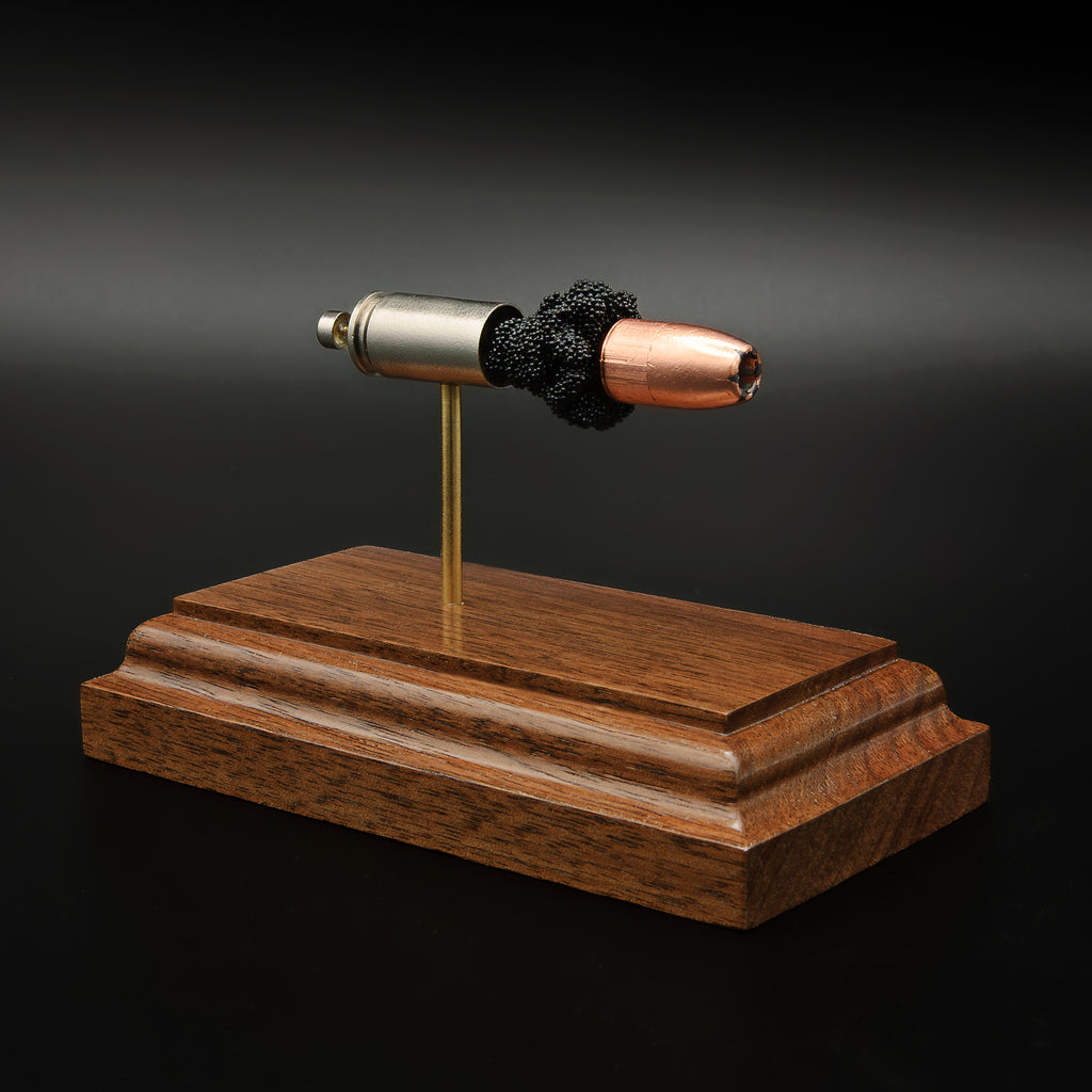 educational handgun cartridge model illustrating internal components of a 9mm luger
