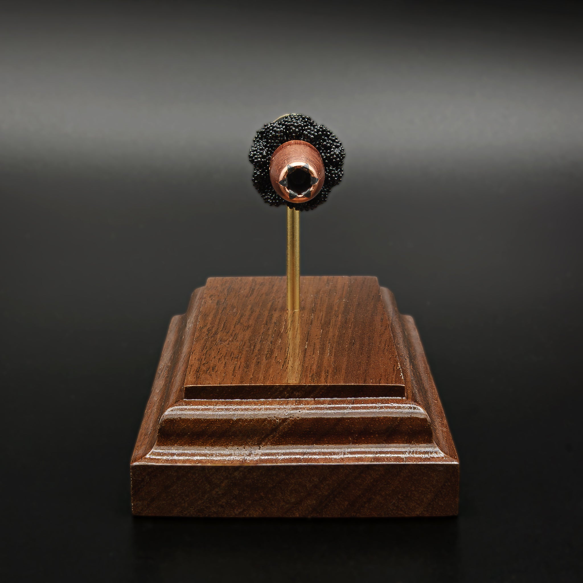 Speer Gold Dot cartridge display for firearm enthusiast gift on walnut base