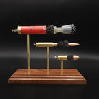 Heavy Metal 3-Gun cartridge display with 12 gauge #7.5 shot, 308 Winchester 168gr Sierra MatchKing and 45 Auto mounted on a hardwood base.