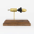 Sectioned 45 Auto 230gr FMJ cartridge showing primer case powder and bullet aligned horizontally