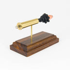 Sectioned 45-70 Government rifle cartridge showing primer case powder and hollow point bullet aligned horizontally