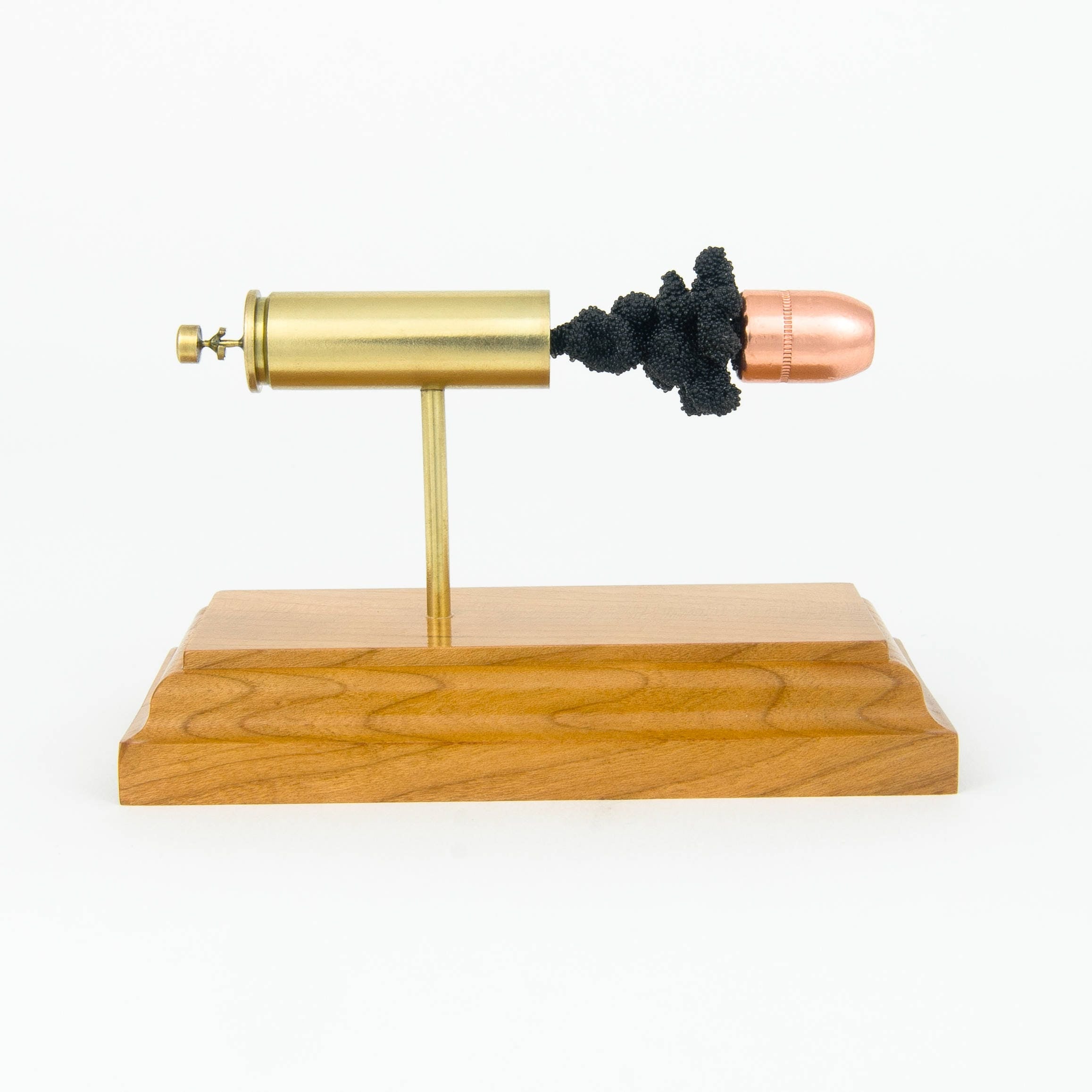 Sectioned 500 S&W Magnum cartridge showing primer case powder and 350gr Hornady XTP bullet aligned horizontally
