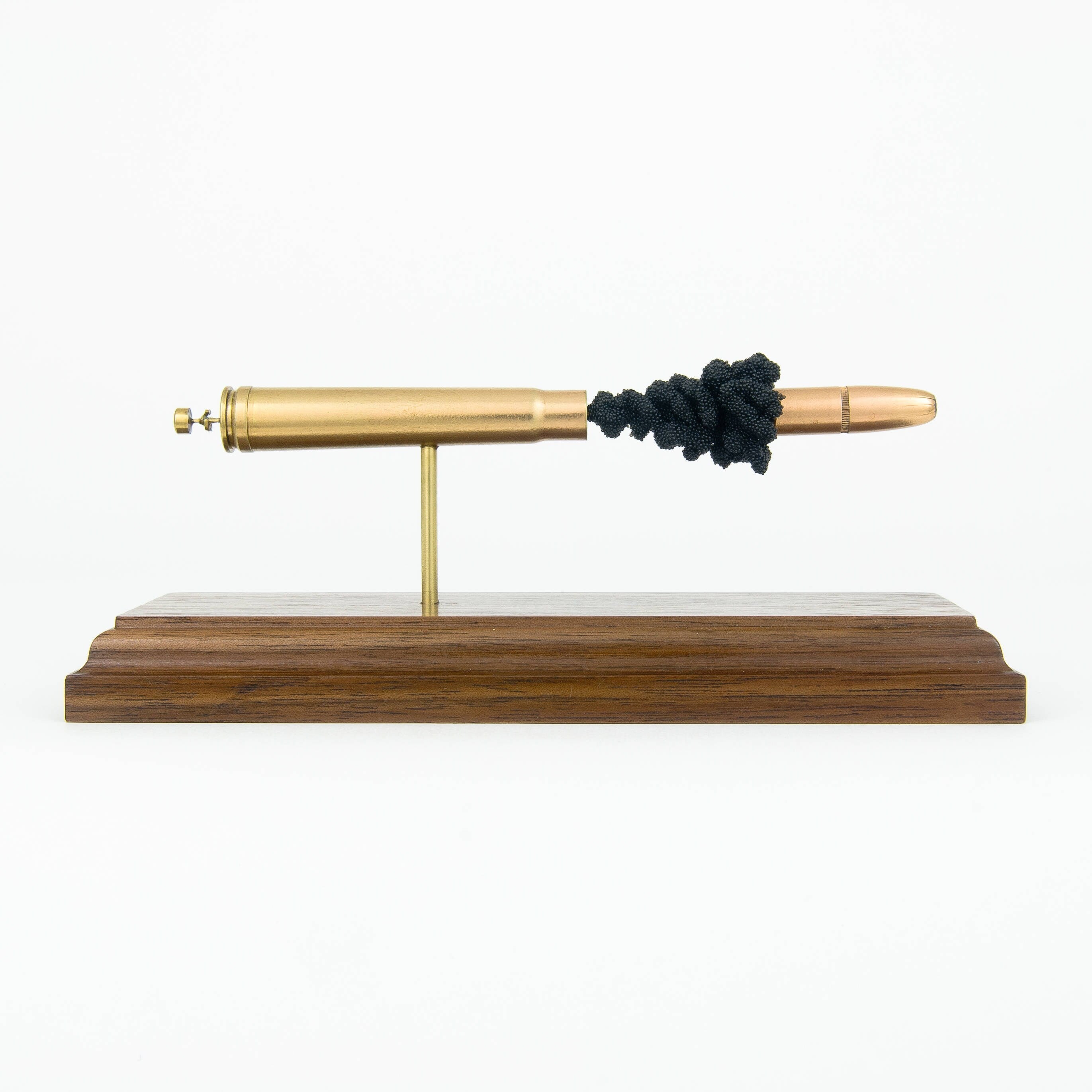 Expanded 375 H&H Magnum Hornady DGX cartridge display on hardwood base