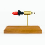 Handmade 9mm cartridge display aligned components mounted on solid wood base