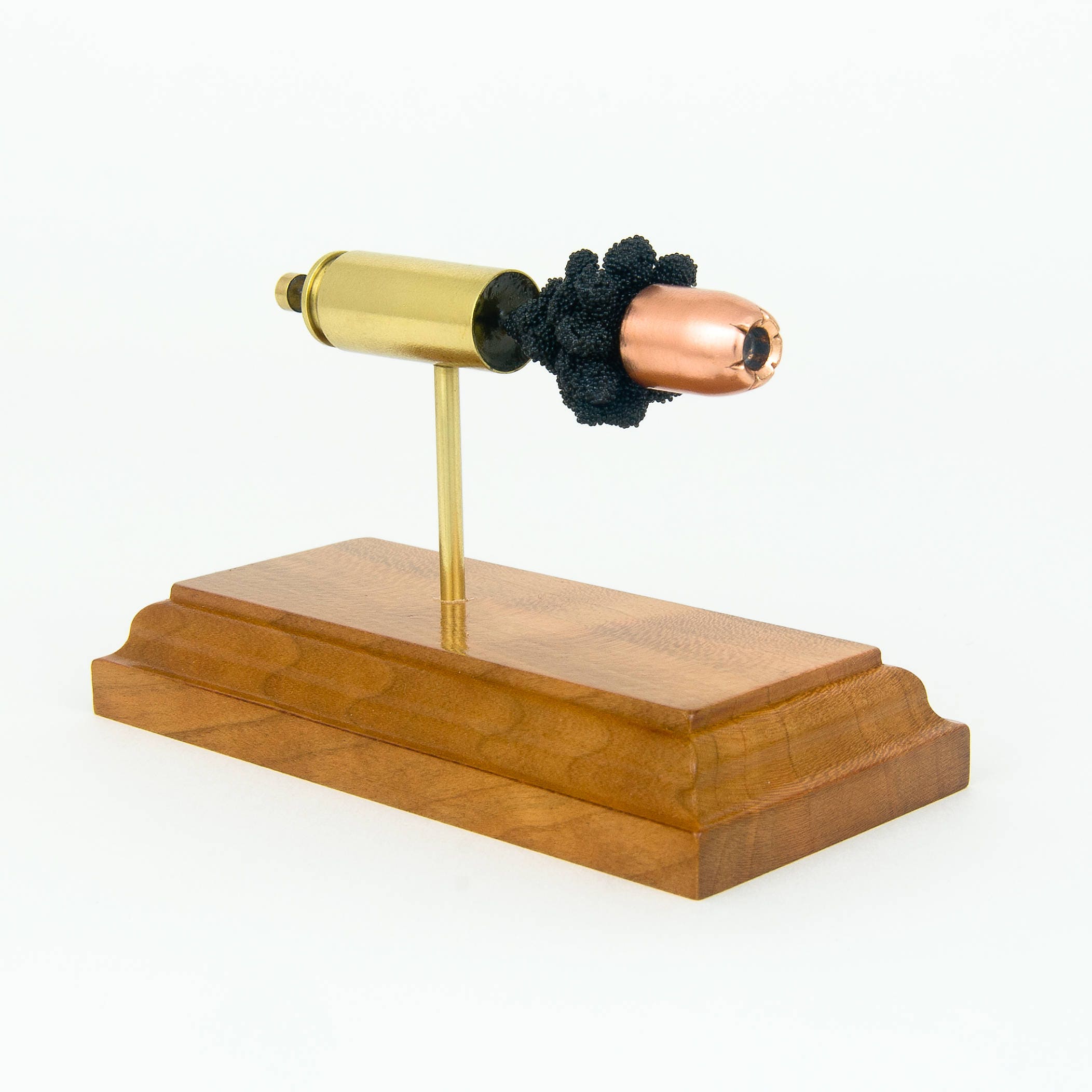 50 AE cutaway cartridge display mounted on solid hardwood base