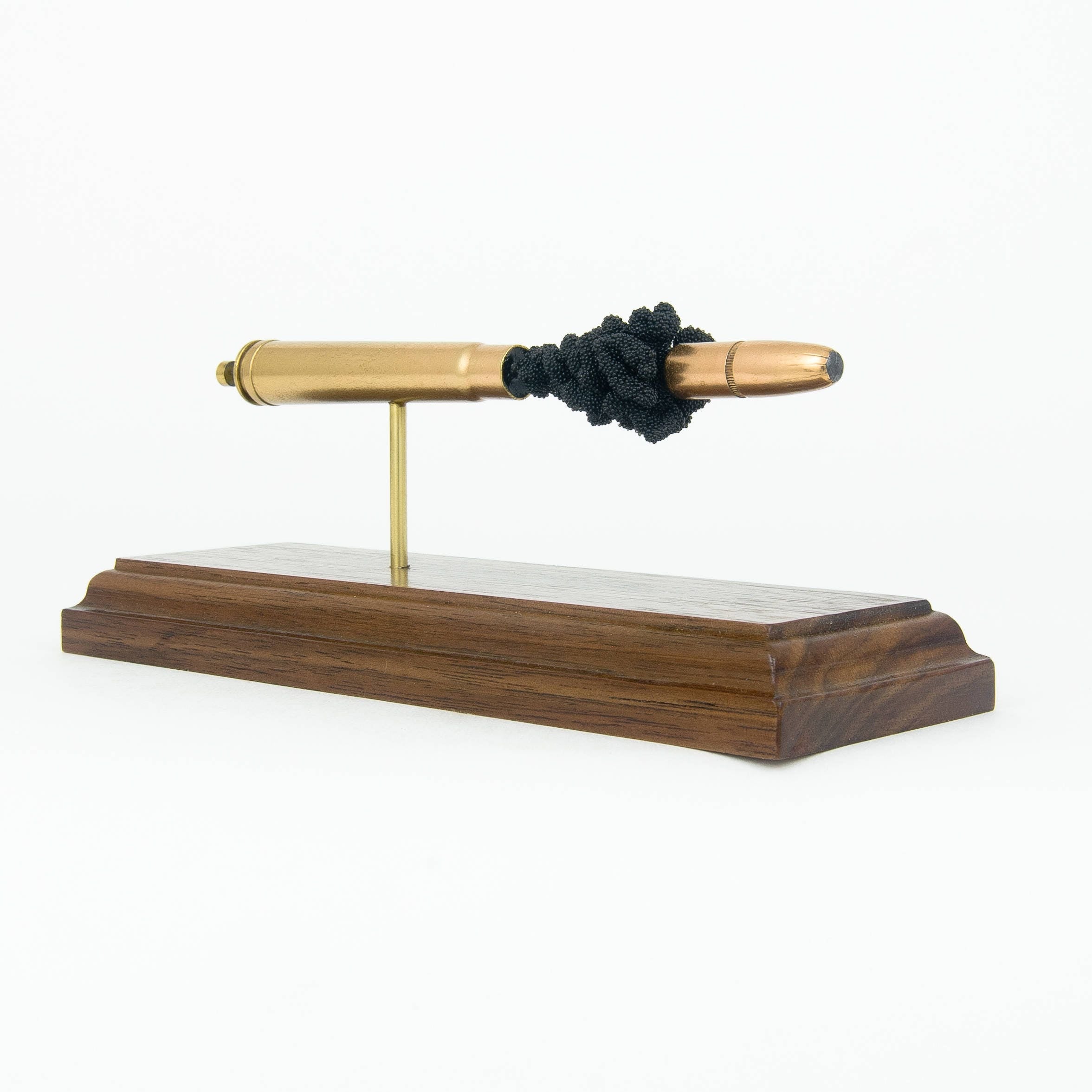 Expanded 375 H&H Magnum Hornady DGX cartridge display on hardwood base