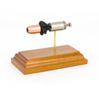 Sectioned 45 Auto Speer Gold Dot cartridge showing primer case powder and bonded hollow point bullet aligned horizontally