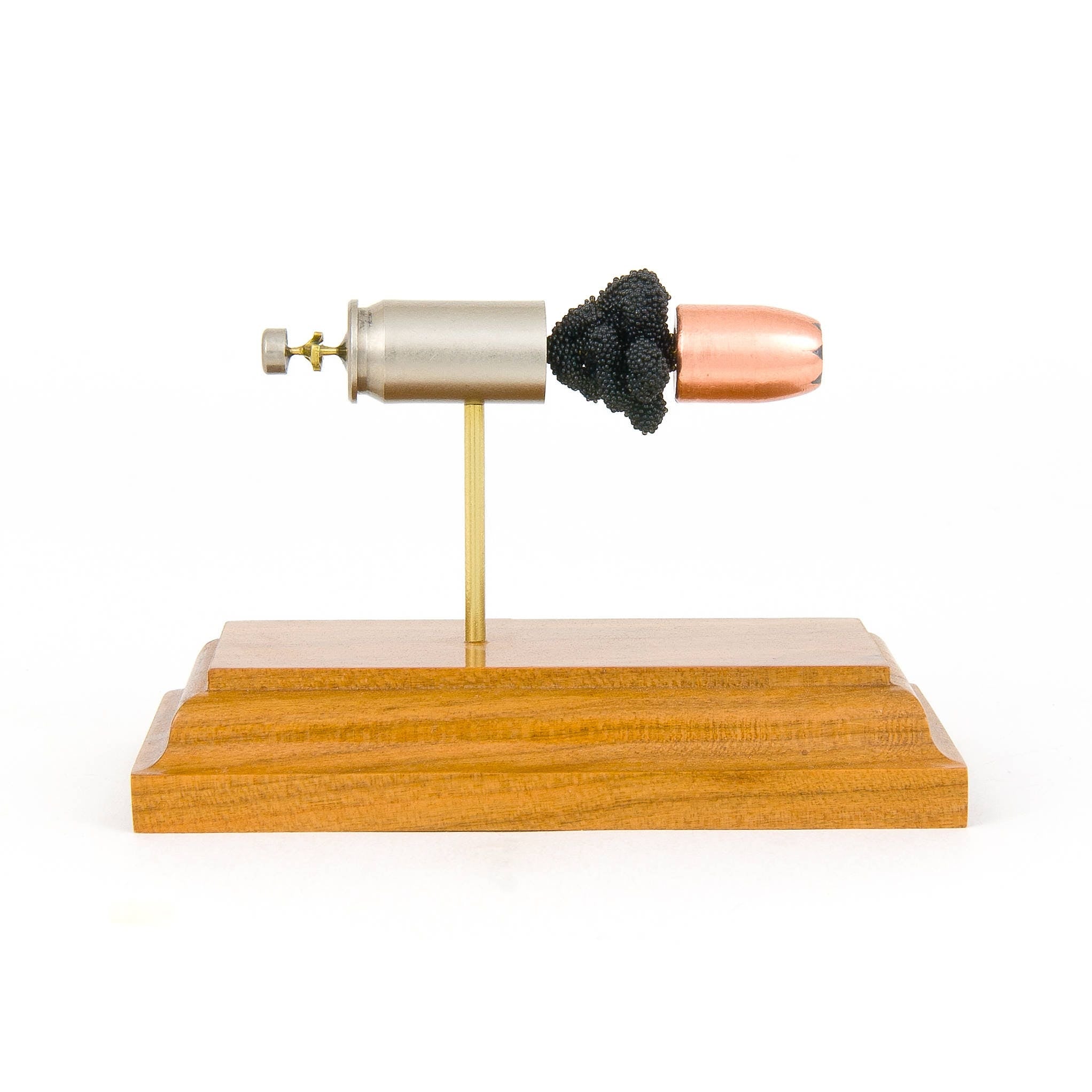 45 Auto 230gr GDHP cutaway cartridge display mounted on solid hardwood base