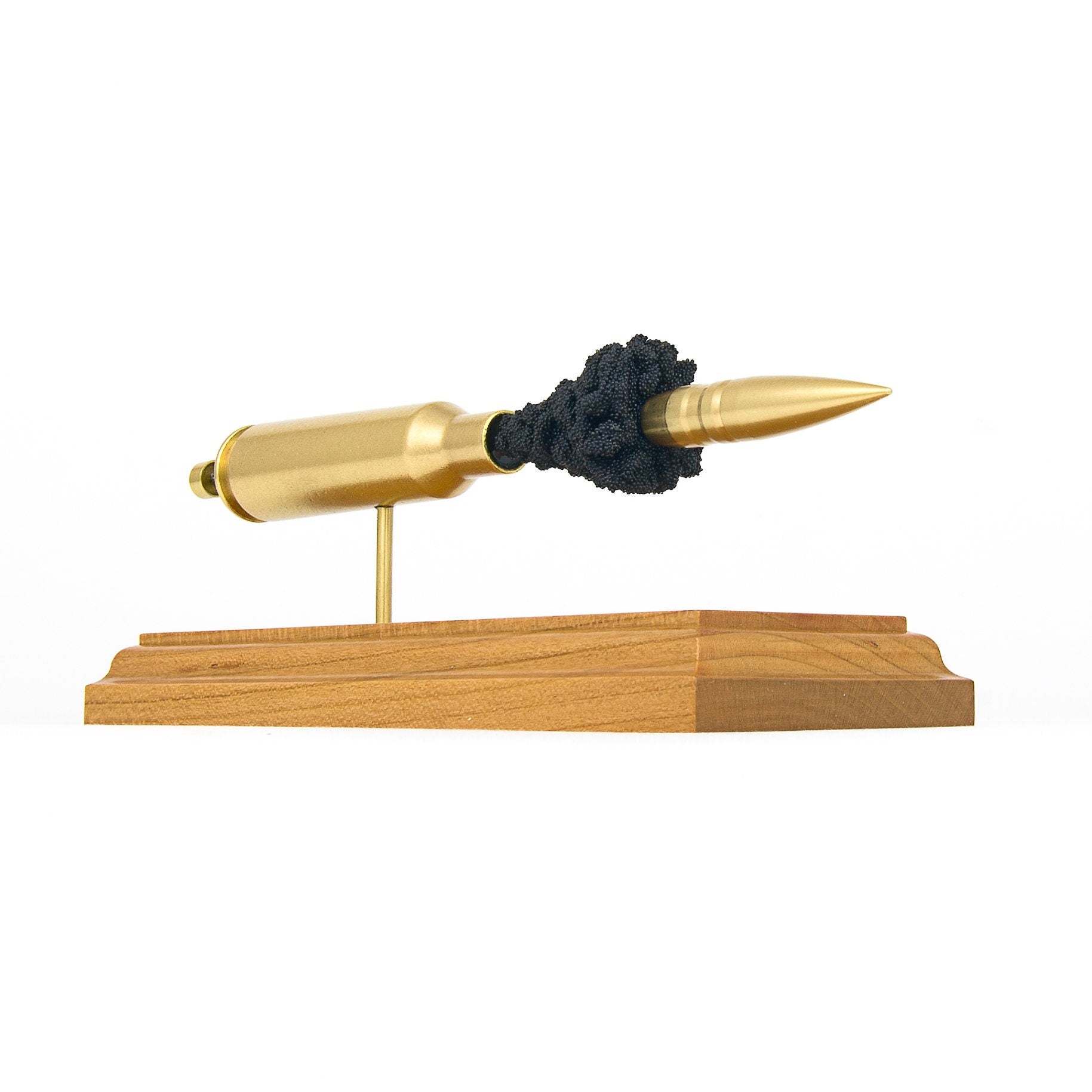 Expanded 416 Barrett Lehigh Defense 416gr solid brass cartridge display on hardwood base