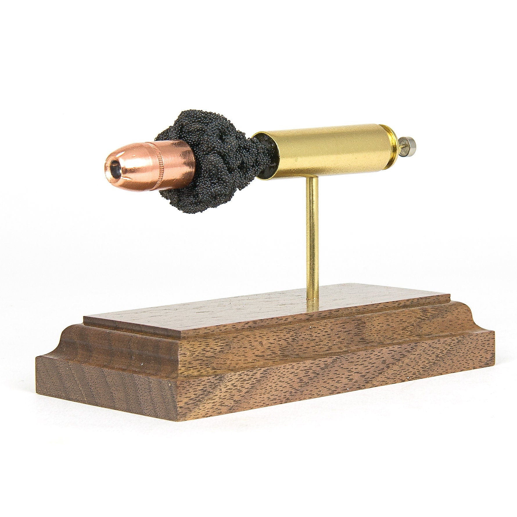 450 Bushmaster cutaway cartridge display mounted on solid hardwood base