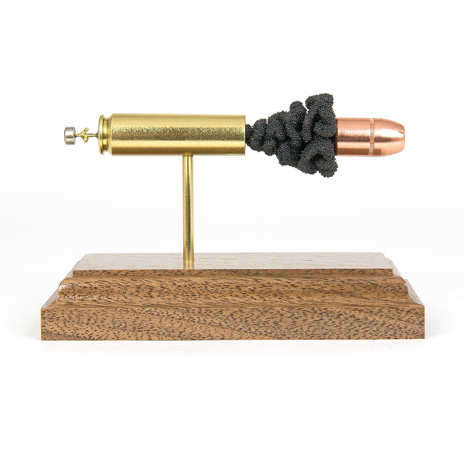 Sectioned 450 Bushmaster cartridge showing primer case powder and 300gr XTP Mag bullet aligned horizontally