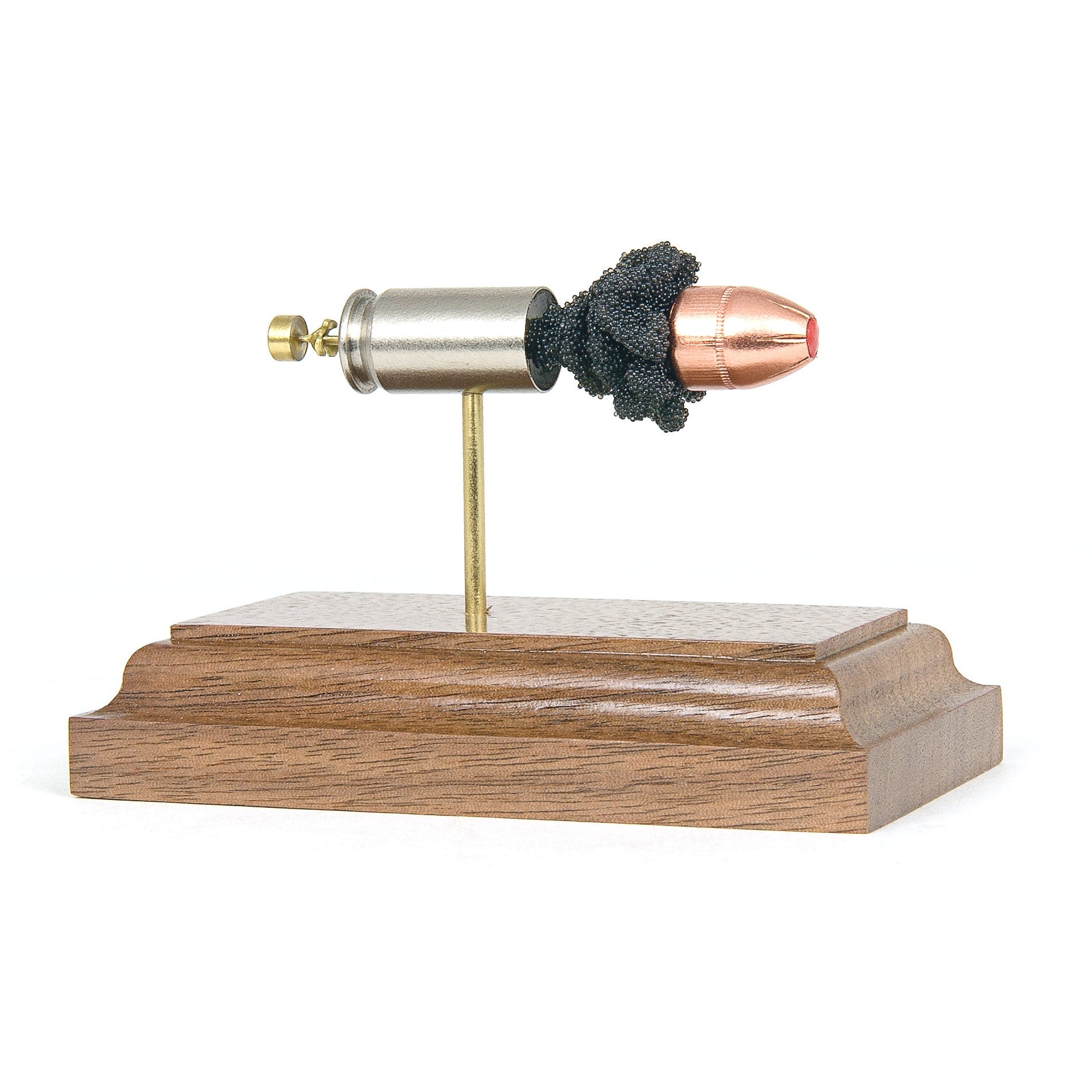 45 Auto Hornady Critical Defense 185gr FTX expanded cartridge display model on walnut base