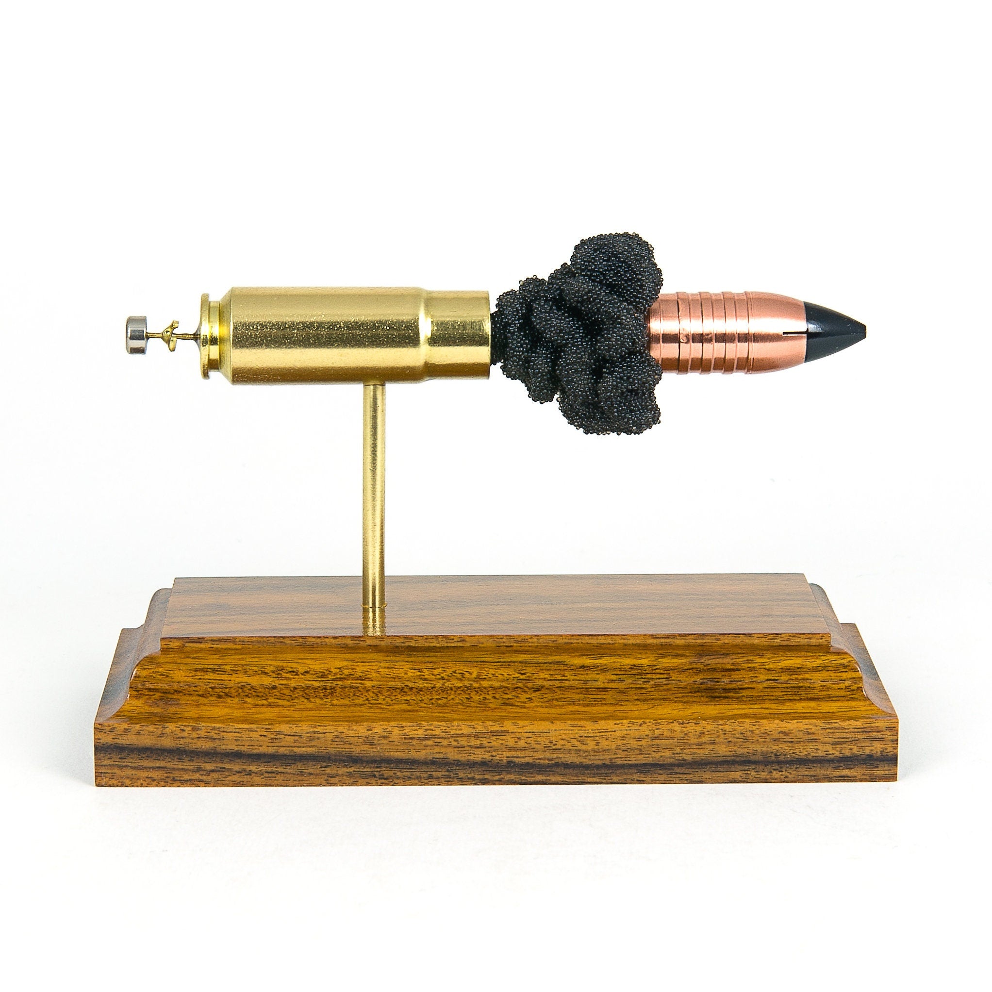 Sectioned 458 SOCOM cartridge showing primer case powder and Flat Base Raptor bullet aligned horizontally